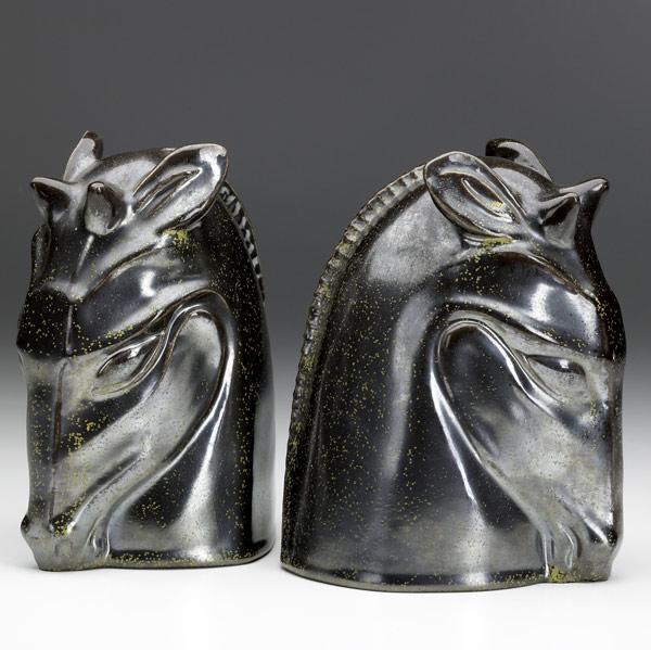 Appraisal: KENTON HILLS Pair of giraffe head bookends covered in gunmetal