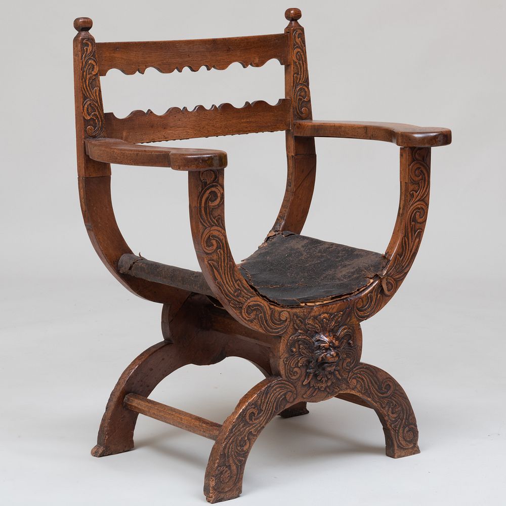 Appraisal: Italian Savanarola Style Carved Fruitwood and Leather Armchair Monogrammed on