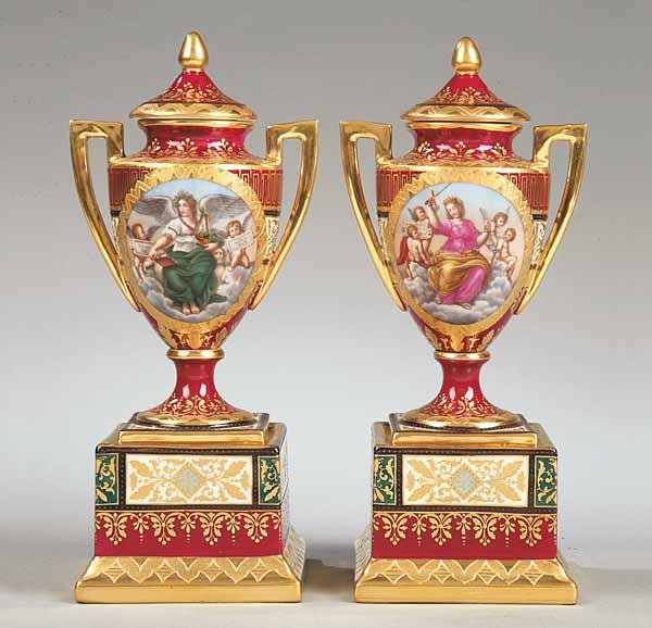 Appraisal: A Pair of Royal Vienna Porcelain Covered Pedestal Urns probably