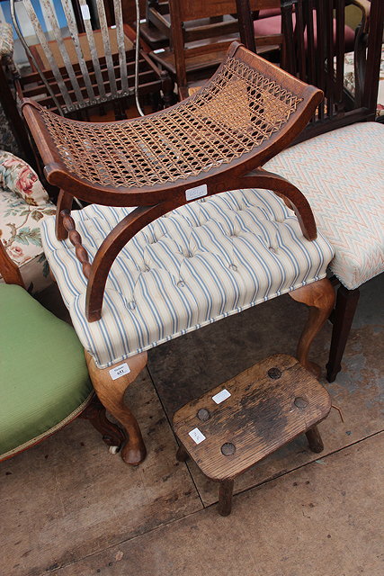 Appraisal: A DRESSING TABLE STOOL with cabriole legs and overstuffed button