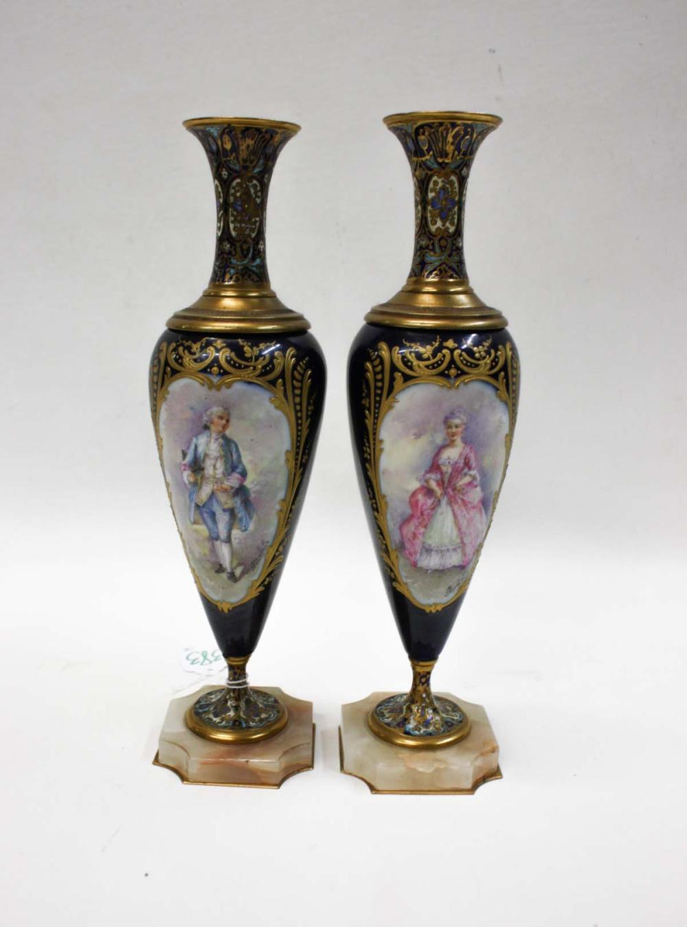 Appraisal: PAIR OF SEVRES STYLE PORCELAIN VASES each featuring to reserves