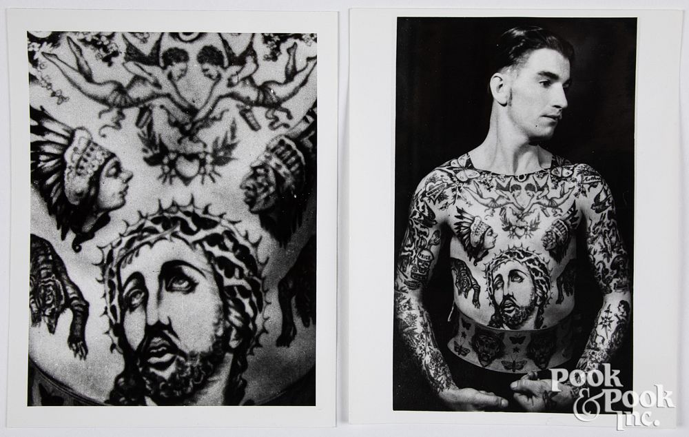 Appraisal: Two photographs of a tattooed man and woman Two silver