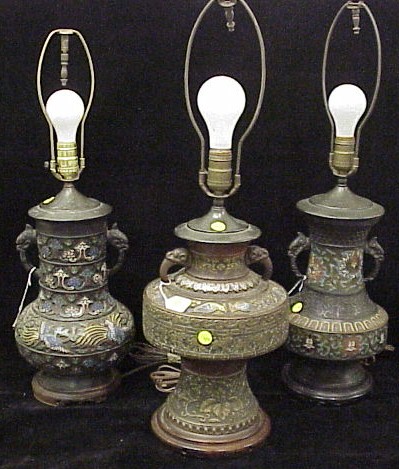 Appraisal: Three Champleve brass vases now electrified and mounted as lamps