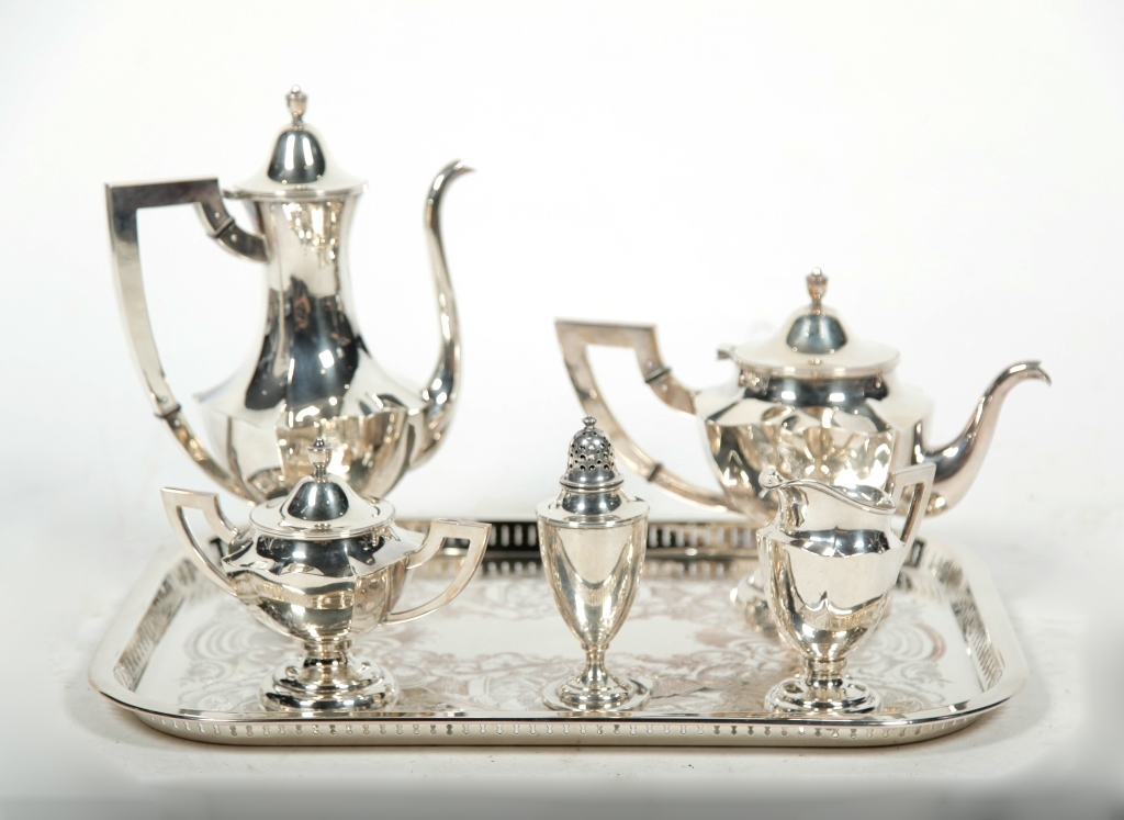 Appraisal: STERLING TEA SET AND MUFFINEER Four piece sterling tea seat