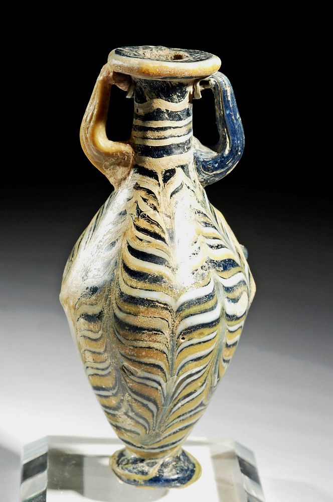 Appraisal: Greek Core-Form Glass Amphoriskos for Oil Originally Listed At Ancient