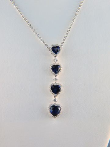 Appraisal: Sapphire Diamond Necklace four vivid blue heart shape gems totaling