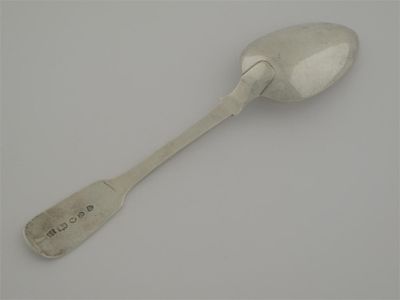 Appraisal: A Victorian fiddle dessert spoon initialled JEB by John Sutter