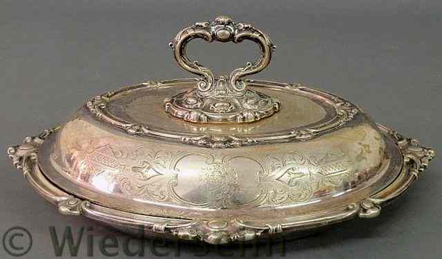 Appraisal: Ornate silverplate covered vegetable dish with engraved armorial crest h