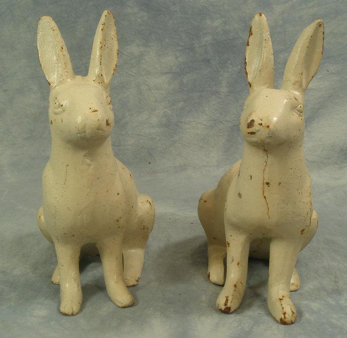 Appraisal: Pr cast iron rabbits h Estimate -