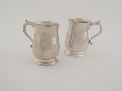 Appraisal: A pair of George II Irish mugs of baluster form