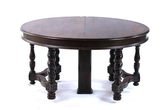 Appraisal: BAROQUE REVIVAL OAK DINING TABLE th century Expanding rounded ends