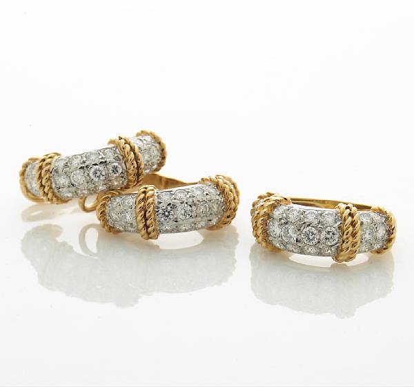 Appraisal: A diamond ring and a pair of clip-earrings Fred Paris