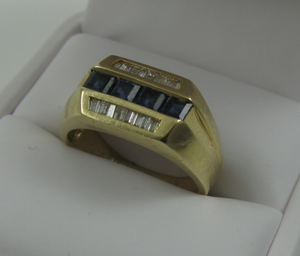 Appraisal: SAPPHIRE DIAMOND AND FOURTEEN KARAT GOLD RING set with four