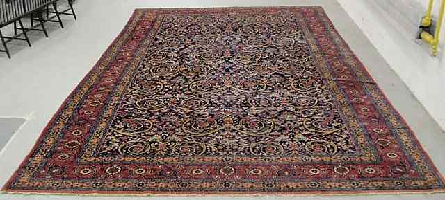 Appraisal: Palace size Isfahan oriental carpet dark blue field red border