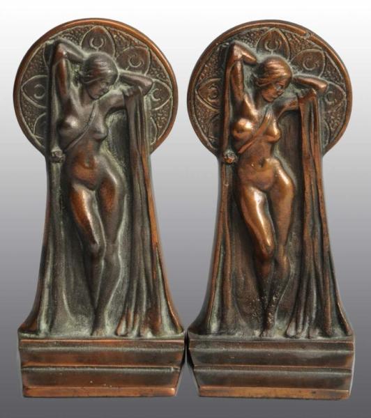 Appraisal: Pair of Bronze Art Deco Nude Bookends Description No damage