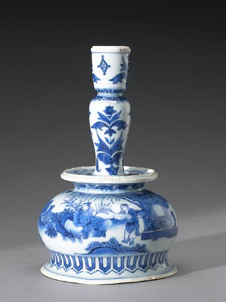 Appraisal: A blue and white porcelain candlestick Transitional The waisted shaft