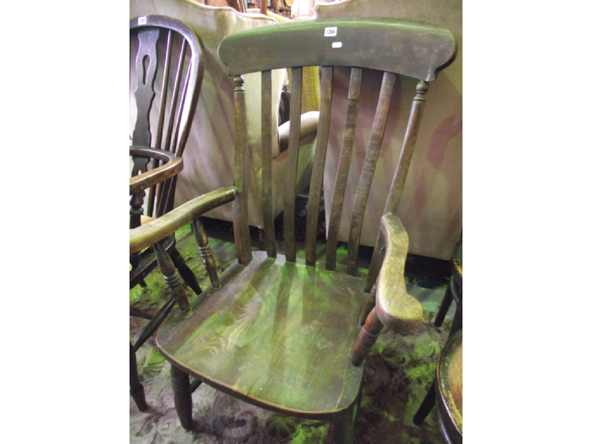 Appraisal: A Windsor elbow chair on turned supports