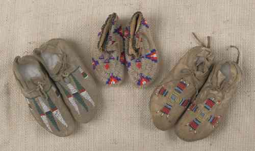 Appraisal: Two pair of partially beaded Sioux child's moccasins ca together