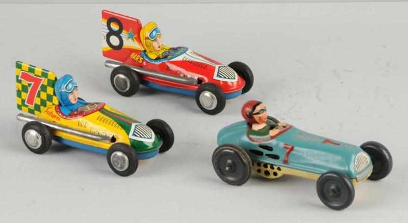 Appraisal: Lot of Tin Race Car Friction Toys Description Japanese One