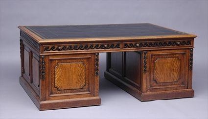 Appraisal: GEORGE III OAK PEDESTAL PARTNER'S DESK The rectangular leather-inset top