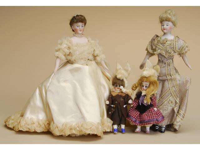 Appraisal: Lot Four Dollhouse Dolls Includes two quality dollhouse women with