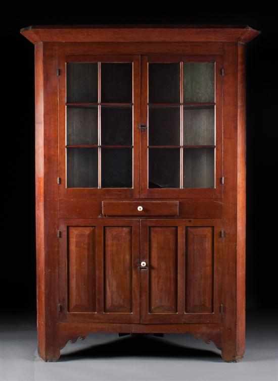 Appraisal: Federal cherrywood corner cupboard Pennsylvania circa with double glazed panel