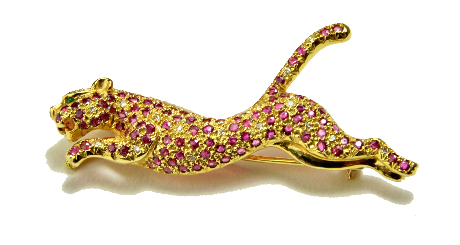 Appraisal: A gold ruby and diamond set brooch designed as a