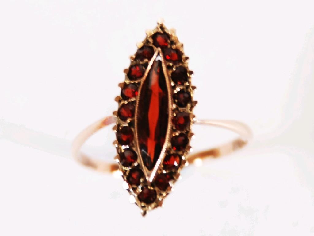 Appraisal: ct GOLD AND GARNET MARQUISE RING set with a marquise