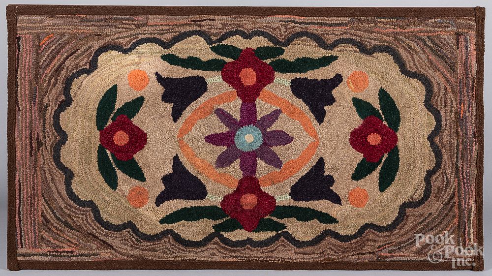 Appraisal: American floral hooked rug early th c American floral hooked