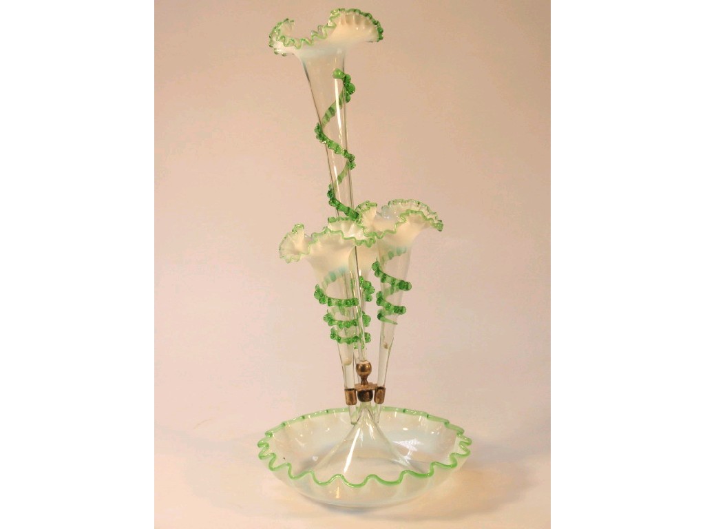 Appraisal: A vaseline glass table epergne the dish base with wavy