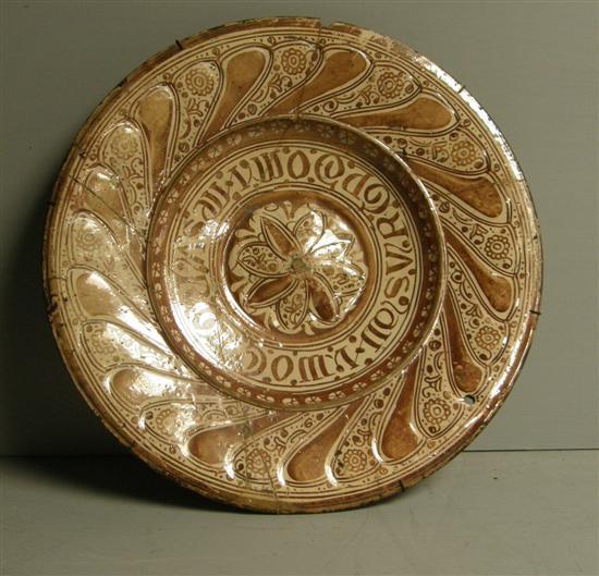 Appraisal: th th century Hispano-Moresque copper lustre charger the convex centre