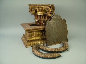 Appraisal: A carved and giltwood capital and plinth a shaped boulle