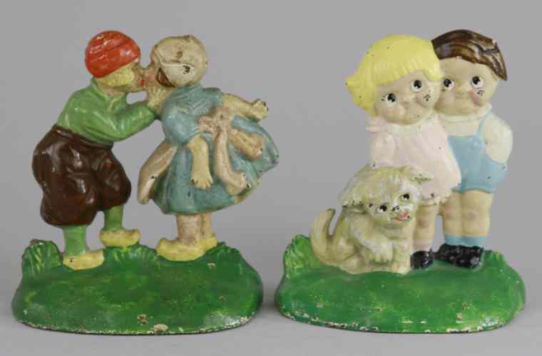 Appraisal: BOOKENDS OF DUTCH COUPLE CAMPBELL KIDS Dutch couple bookend colorful