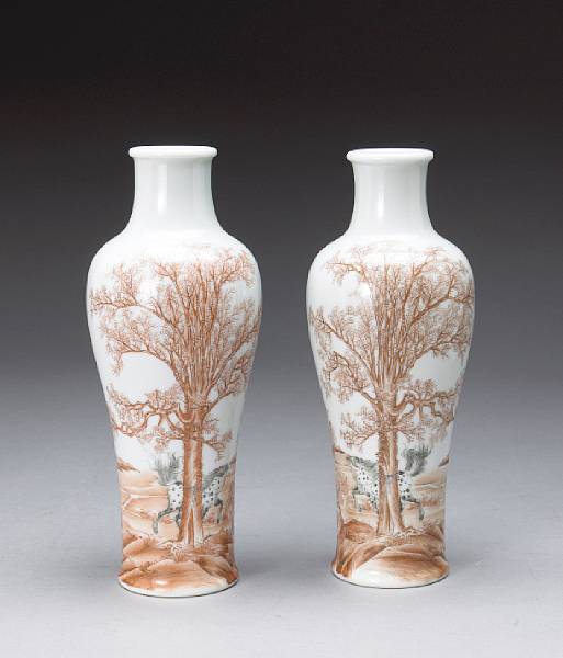 Appraisal: A pair of sepia and black-enameled porcelain vases Qianlong Marks