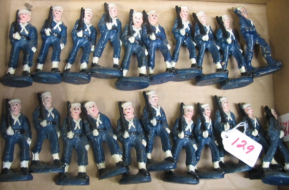 Appraisal: A GROUP OF PAINTED COMPOSITION MILITARY FIGURES of sailors in