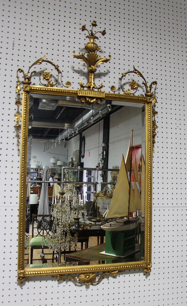 Appraisal: Adams Style Carved And Giltwood Mirror With Shield And Urn