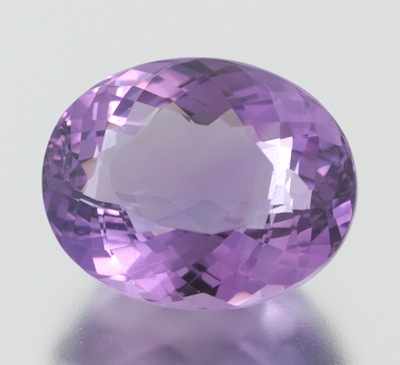 Appraisal: An Unmounted Carat Amethyst Oval faceted cut amethyst weighing ct