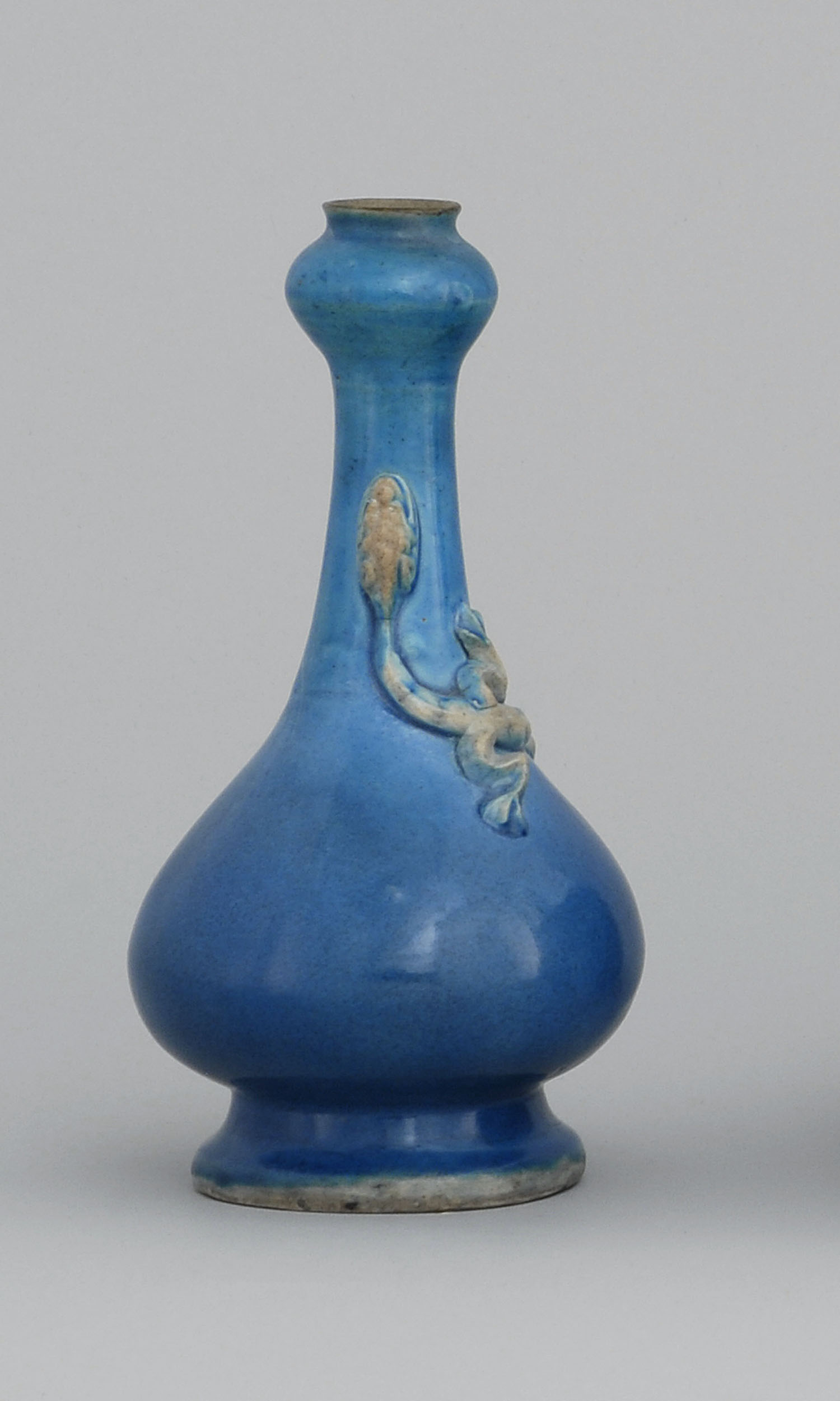 Appraisal: TURQUOISE GLAZE PORCELAIN BOTTLE VASE Kangxi PeriodIn gourd form with