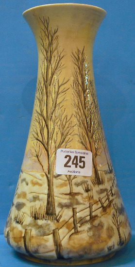 Appraisal: Cobridge Stoneware Vase decorated with Frosty Woodland Scenes height cm