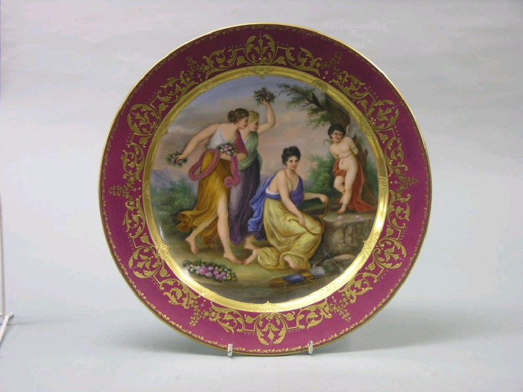 Appraisal: A large th century 'Vienna' wall plate painted with cupid