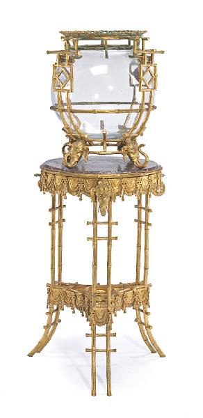 Appraisal: A very fine French Aesthetic gilt bronze and glass aquarium