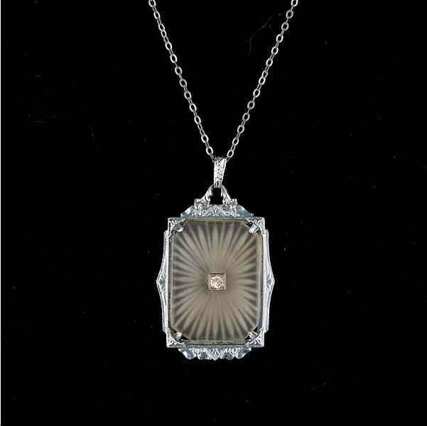 Appraisal: Lalique Style Pendant A sterling chain with a Lalique style