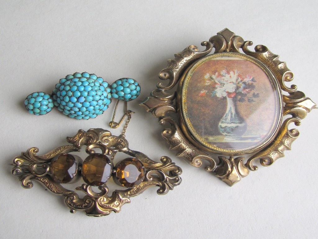 Appraisal: Lot comprising turquoise set Victorian brooch scrollwork remembrance brooch and