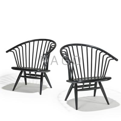 Appraisal: ILMARI TAPIOVAARA ASKO Pair of ebonized wood Crinolette chairs Finland