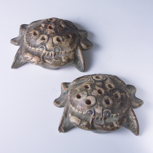 Appraisal: Pair of WELLER Crab flower frogs Two chips to underside