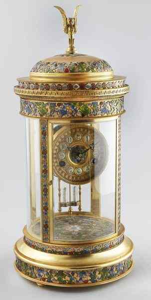 Appraisal: French champleve and gilt bronze mantel clockof circular form Brass