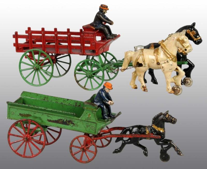 Appraisal: Lot of Cast Iron Kenton Horse-Drawn Toys Description Includes one