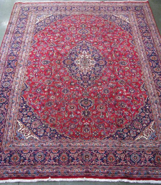 Appraisal: Handmade Oriental Room Size Rug Kashan design red field with