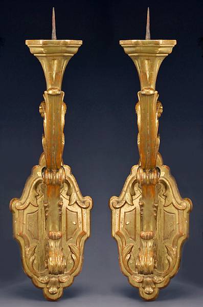 Appraisal: A pair of Italian Neoclassical carved giltwood wall candle prickets