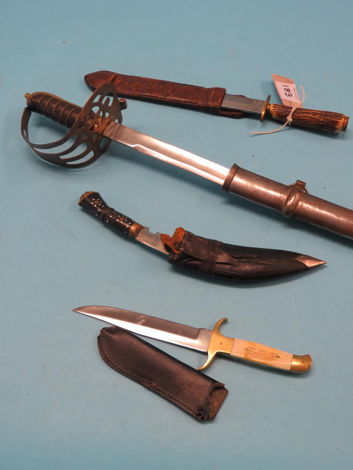 Appraisal: A dress sword in curved single-edged blade in steel scabbard